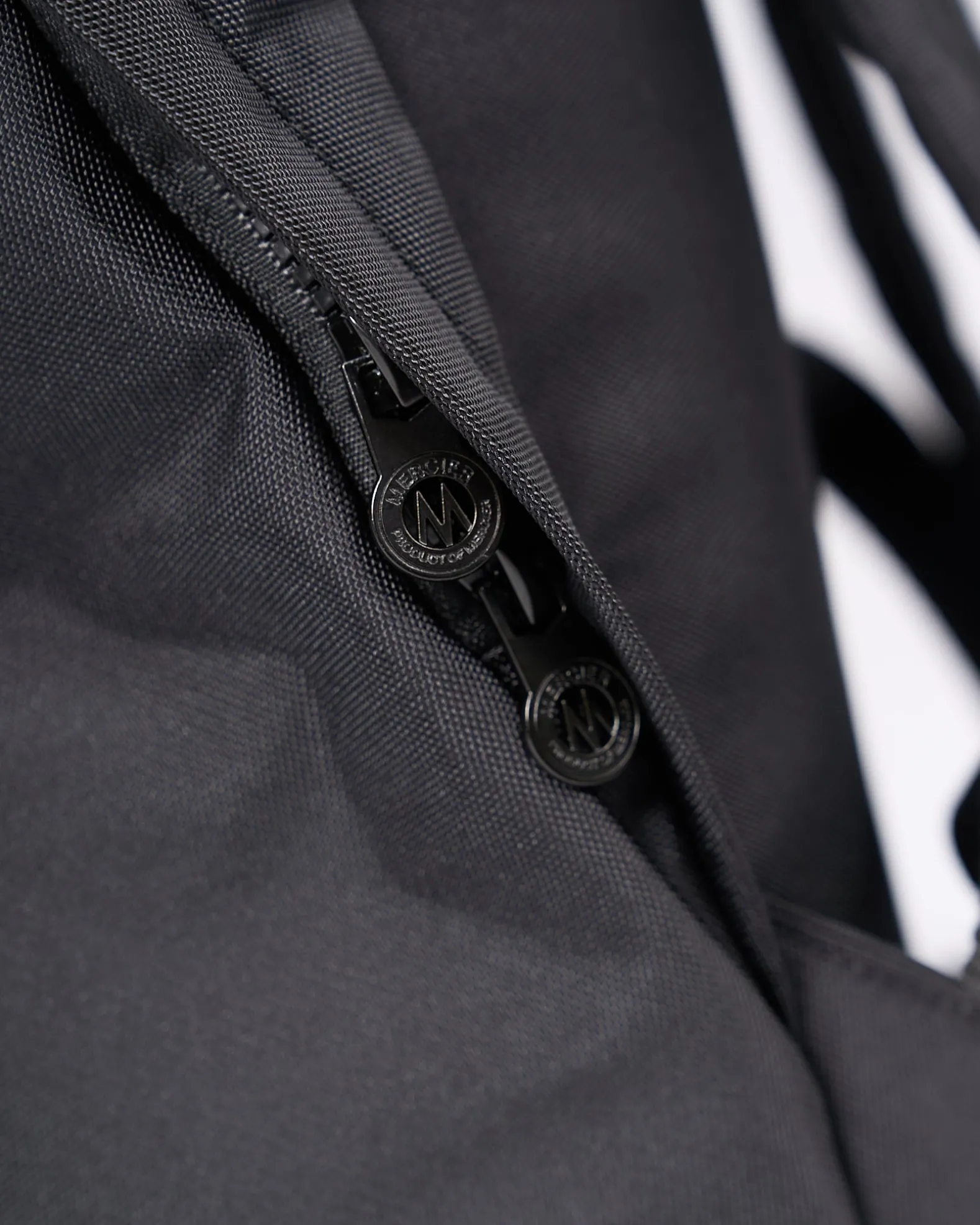 Black Mono Badge Backpack