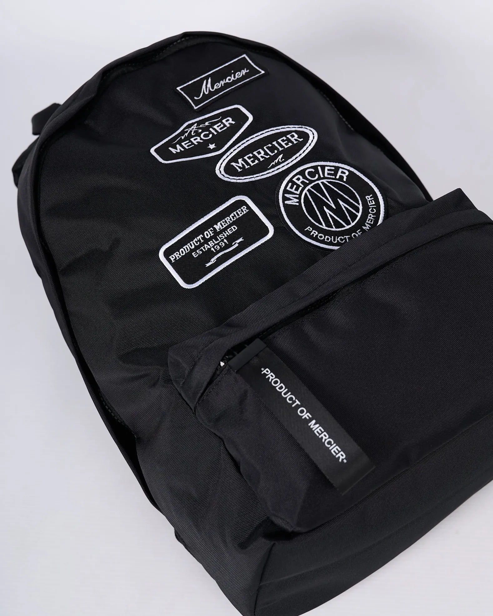Black Mono Badge Backpack